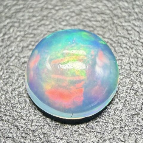 Drahý opál 0,4ct – Kabošon – Welo, Etiopie
